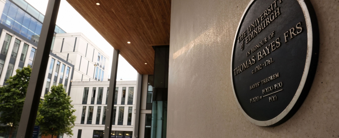 The plaque commemorating the Bayes Centre and a view of the courtyard